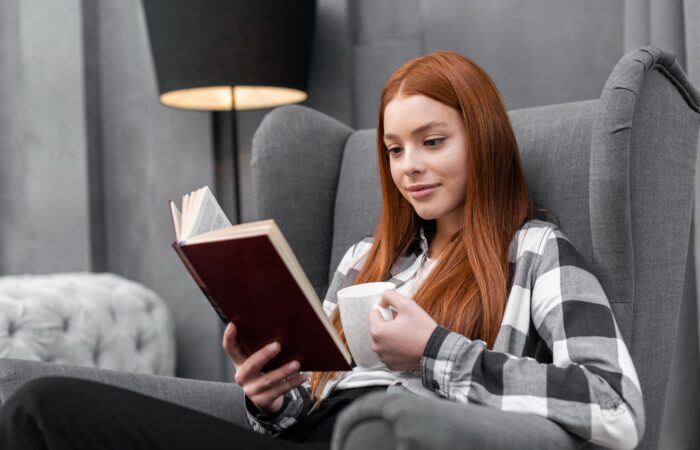 woman-reading-book-700x450 About Us